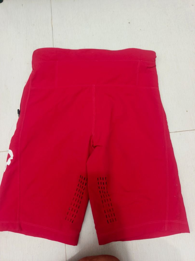 Fox Racing Mountain Biking Shorts Red Size 32 (Category: Shorts) located in Antipolo. Submitted by rekreek (Listing ID 1470871289, Image 2). Description: - Brand: Red Fox Racing MTB Shorts - Size: 32 - Design: Large white Fox head logos on both legs - Closure: Secure ratchet waist system - Pockets: Convenient zipped side pockets - Ventilation: Perforated holes on front and back for maximum airflow - Material: 71% polyester, 17% polyamide nylon, 7