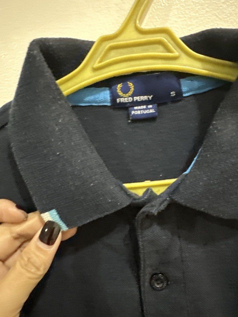 Fred Perry small navy blue polo shirt (Category: Tshirts & Polo Shirts ) located in Lipa City. Submitted by jnlxv87 (Listing ID 1470847153, Image 3). Description: Small on tag Shoulders39cm Width 44cm Length 62cm.