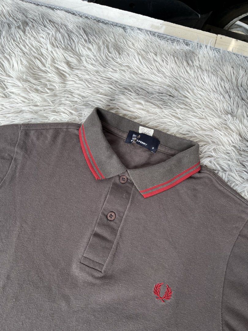 Fred Perry Two Tone Polo Shirt (Category: Tshirts & Polo Shirts ) located in Lipa City. Submitted by kent.finds (Listing ID 1470876891, Image 2). Description: Dimension: 📏W 18 📏L 26 Color Rate: 9.8/10 📌 Excellent Condition 💸 Mine : ₱850 + Shipping Fee🚚 Issue: ❌.