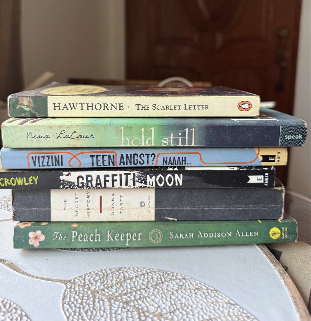 FREE BOOKS (Take all only) (Category: Storybooks) located in San Pedro. Submitted by irisdclttrs (Listing ID 1470749533, Image 1). Description: - Bundle of 6 paperback books: The Scarlet Letter, Hold Still, Teen Angst? Naaah..., Graffiti Moon, The Secret History, and The Peach Keeper - Condition: Pages have yellowing and aging spots on edges; covers show shelf wear and spine creasing. - Shipping fee c/o miner. Location: San Pedro, Laguna .