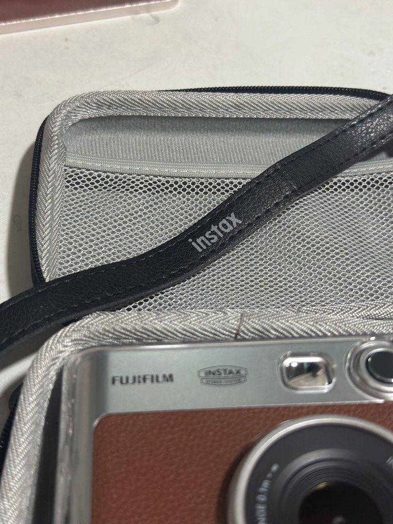 Fujifilm Instax Mini Evo Brown (Category: Cameras) located in Manila. Submitted by ellelements (Listing ID 1470930460, Image 2). Description: INSTAX MINI EVO — Vintage Brown Letting go of my Instax Mini Evo 🤎 ❗️Complete inclusions Complete original accessories FREE hard pouch FREE tempered glass FREE clear case With proof of purchase from Fujifilm ✨ Good condition, no issues, rarely used ✨ RFS: Impulse buy. Hindi ko po talaga siya nagagamit. 📩 