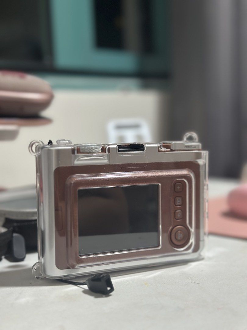 Fujifilm Instax Mini Evo Brown (Category: Cameras) located in Manila. Submitted by ellelements (Listing ID 1470930460, Image 3). Description: INSTAX MINI EVO — Vintage Brown Letting go of my Instax Mini Evo 🤎 ❗️Complete inclusions Complete original accessories FREE hard pouch FREE tempered glass FREE clear case With proof of purchase from Fujifilm ✨ Good condition, no issues, rarely used ✨ RFS: Impulse buy. Hindi ko po talaga siya nagagamit. 📩 