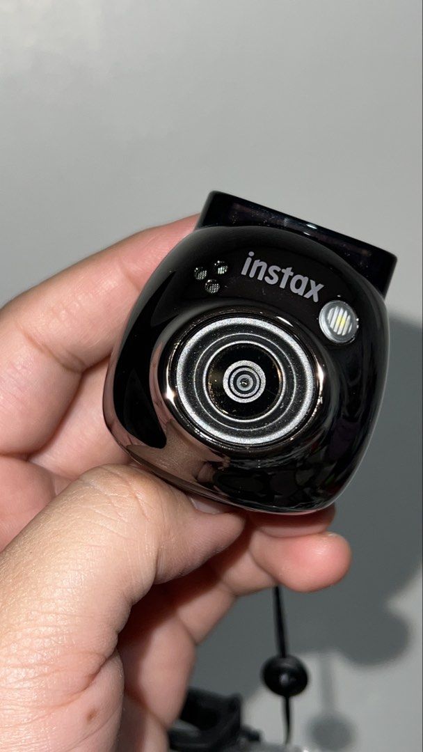 FUJIFILM Instax PAL (Category: Cameras) located in Cebu City. Submitted by fromreggg (Listing ID 1470856517, Image 1). Description: FUJIFILM INSTAX PAL Color: Black Used only twice No issues Still comes with the box Comes with free case and tripod RFS: Extra camera.