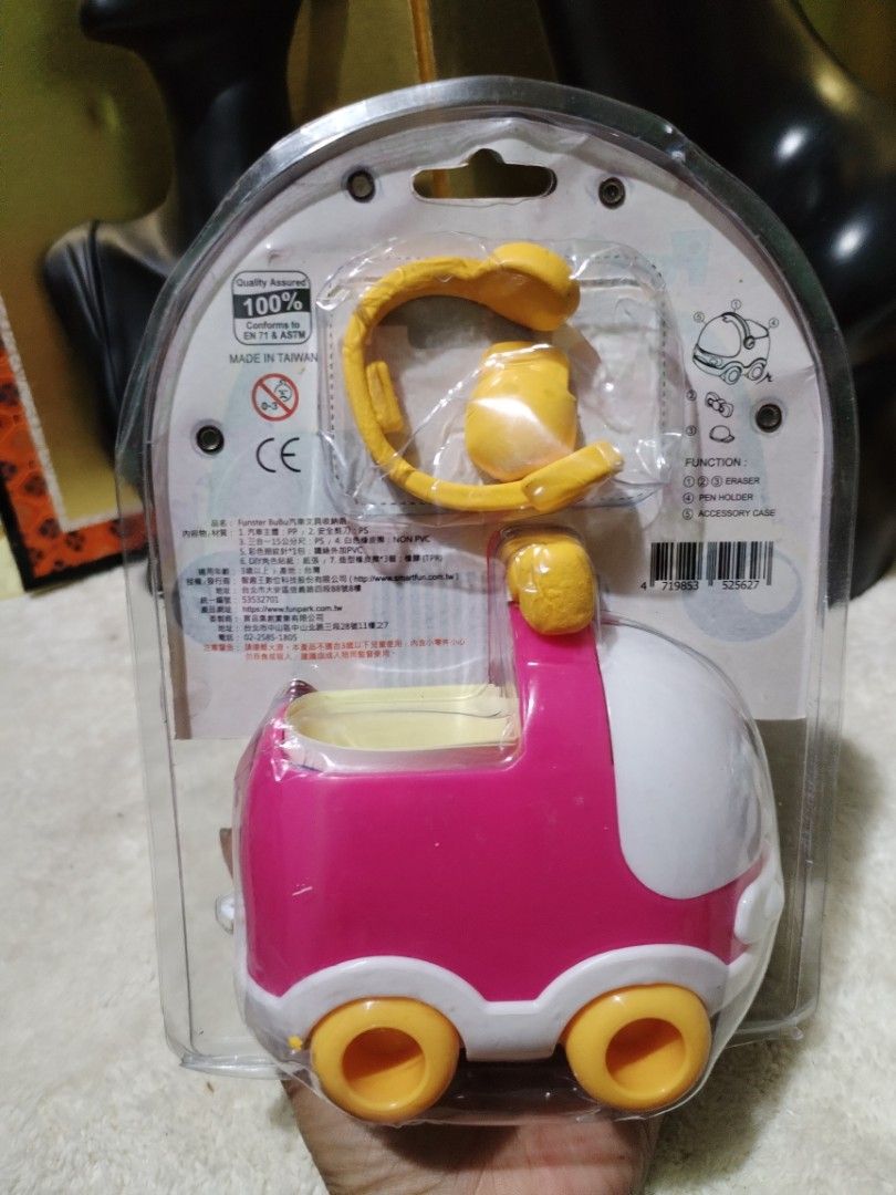 Funster BuBu Car Stationery Set Toy (Category: Stationery & School Supplies) located in La Trinidad. Submitted by malditas (Listing ID 1470898474, Image 2). Description: - Adorable pink Funster BuBu car design with white and yellow wheels - Complete stationery set includes a car pen holder, scissors, ruler, erasers, and stickers - Brand new and sealed in original blister packaging - Made in Taiwan and conforms to safety standards - Great desk acc