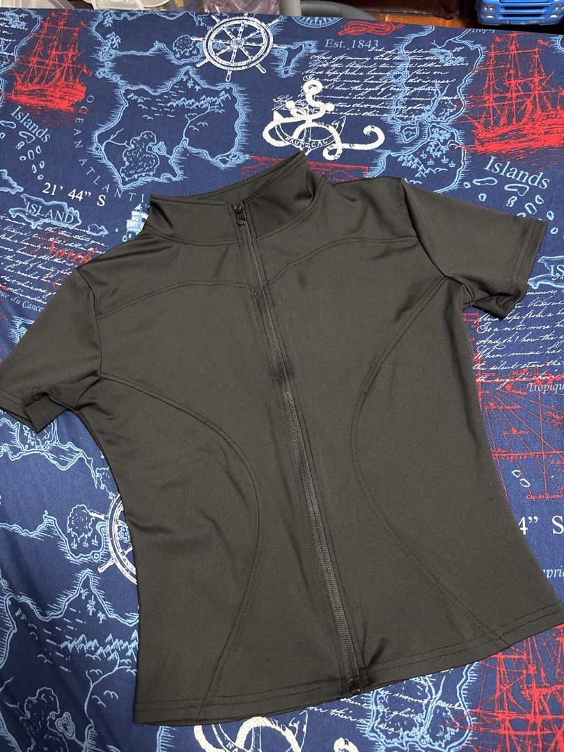 Fuyogi Black short-sleeve athletic zip-up top (Category: Activewear) located in Quezon City. Submitted by iya_handovers (Listing ID 1470834901, Image 2). Description: Used 1x Wrong size ordered. Perfect for yoga, pickleball, running, gym..