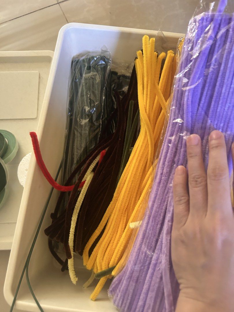 Fuzzy wire (Category: Craft Supplies & Tools) located in General Mariano Alvarez. Submitted by mochiii_72 (Listing ID 1470809291, Image 3). Description: - Complete DIY craft bundle for handmade pipe cleaner flowers and bouquets - Includes assorted pipe cleaners in green, yellow, purple, and brown - Comes with several rolls of green floral tape and white ribbon - All items stored together in handy containers - Plenty of materials left for multiple