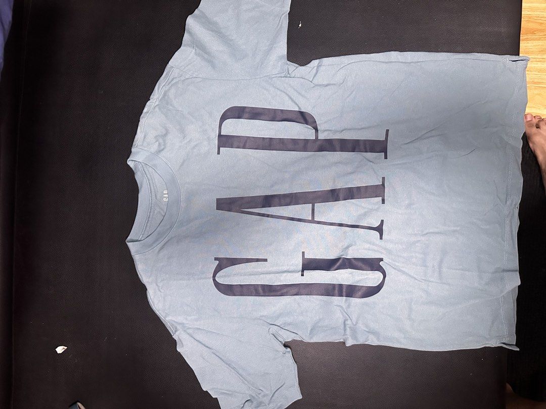 Gap Light Blue T-shirt Size S Oversized (Category: Tshirts & Polo Shirts ) located in Las Pinas. Submitted by boldbear_89ab40 (Listing ID 1470825961, Image 3). Description: - Brand: Gap - Color: Light blue with dark print logo - Size: S - Condition: Clean, no stains or visible damage - Style: Short sleeves, crew neck, great for daily casual wear.