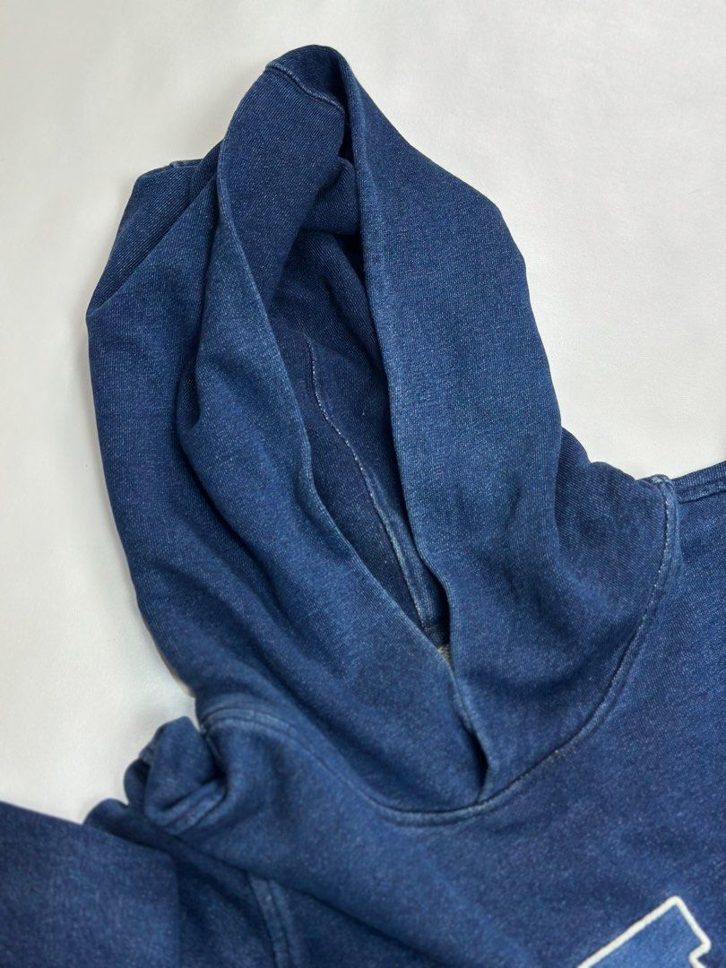 GAP Pigmented Denim Washed Hoodie Size M (Category: Coats, Jackets and Outerwear) located in Daet. Submitted by thrifthings2018 (Listing ID 1470845554, Image 3). Description: - Brand: GAP - Style: Pigmented denim washed hoodie - Color: Classic navy blue with large white chest logo - Size: Medium (Width: 24", Length: 28") - Details: Front kangaroo pocket, lined hood, ribbed cuffs and hem - Origin: Made in Vietnam - Condition: Excellent vintage loo