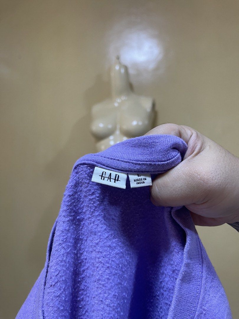 GAP Purple Sweatshirt Size Large (Category: Coats, Jackets and Outerwear) located in Naga. Submitted by 2ndusedclothingstore (Listing ID 1470854521, Image 2). Description: - Brand: GAP - Color: Purple - Size: Large (Relaxed fit with dropped shoulders) - Design: Classic crewneck with large logo lettering across the chest - Comfort: Soft fleece interior, ribbed cuffs, and hem to keep you warm - Origin: Made in India - Condition: Great everyday casu
