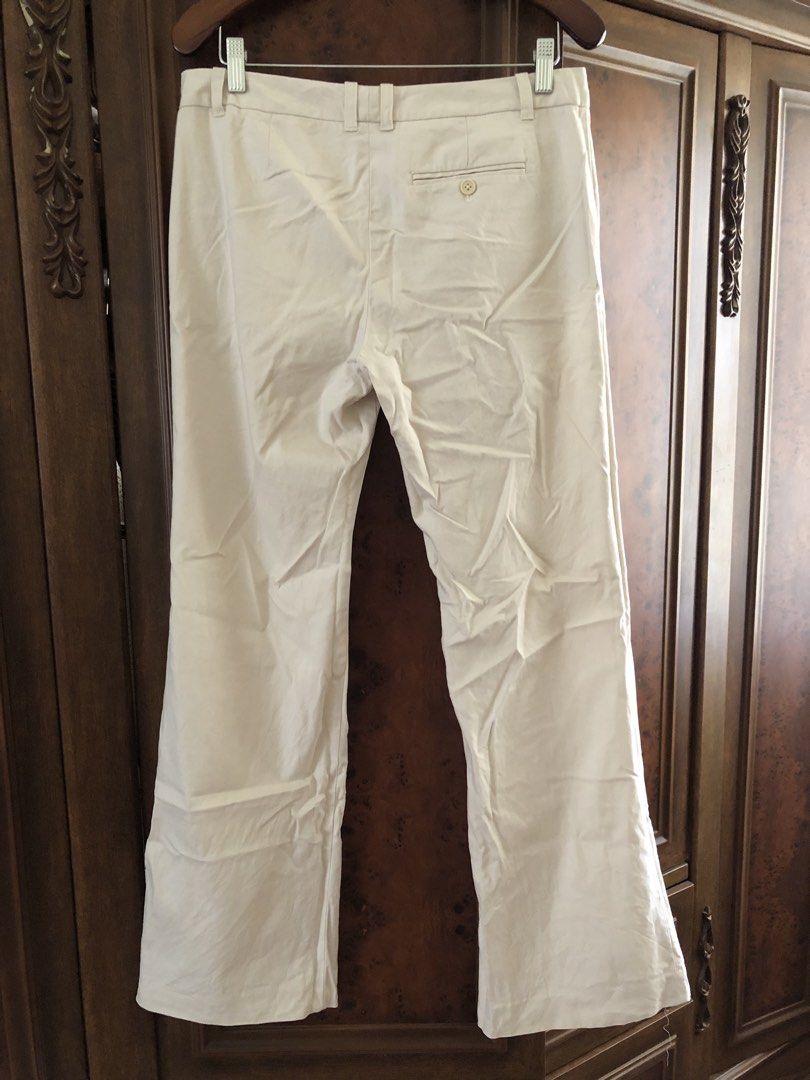 GAP Stretch Cream Trousers Size 8R (Category: Jeans) located in Davao. Submitted by stylecircuit (Listing ID 1470764025, Image 2). Description: - Brand: Gap - Style: Stretch trousers / flare - Color: Cream (Neutral shade) - Size: 8 Regular fit - Waist: low rise with belt loops, zip fly, and button closure - Details: Single back pocket with button detail - Material: Comfortable fabric blend with slight stretch - Origin: Made in Philippines.