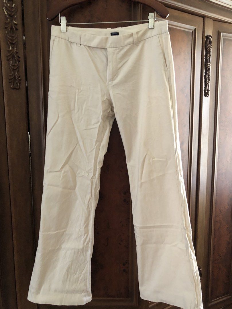 GAP Stretch Cream Trousers Size 8R (Category: Jeans) located in Davao. Submitted by stylecircuit (Listing ID 1470764025, Image 1). Description: - Brand: Gap - Style: Stretch trousers / flare - Color: Cream (Neutral shade) - Size: 8 Regular fit - Waist: low rise with belt loops, zip fly, and button closure - Details: Single back pocket with button detail - Material: Comfortable fabric blend with slight stretch - Origin: Made in Philippines.