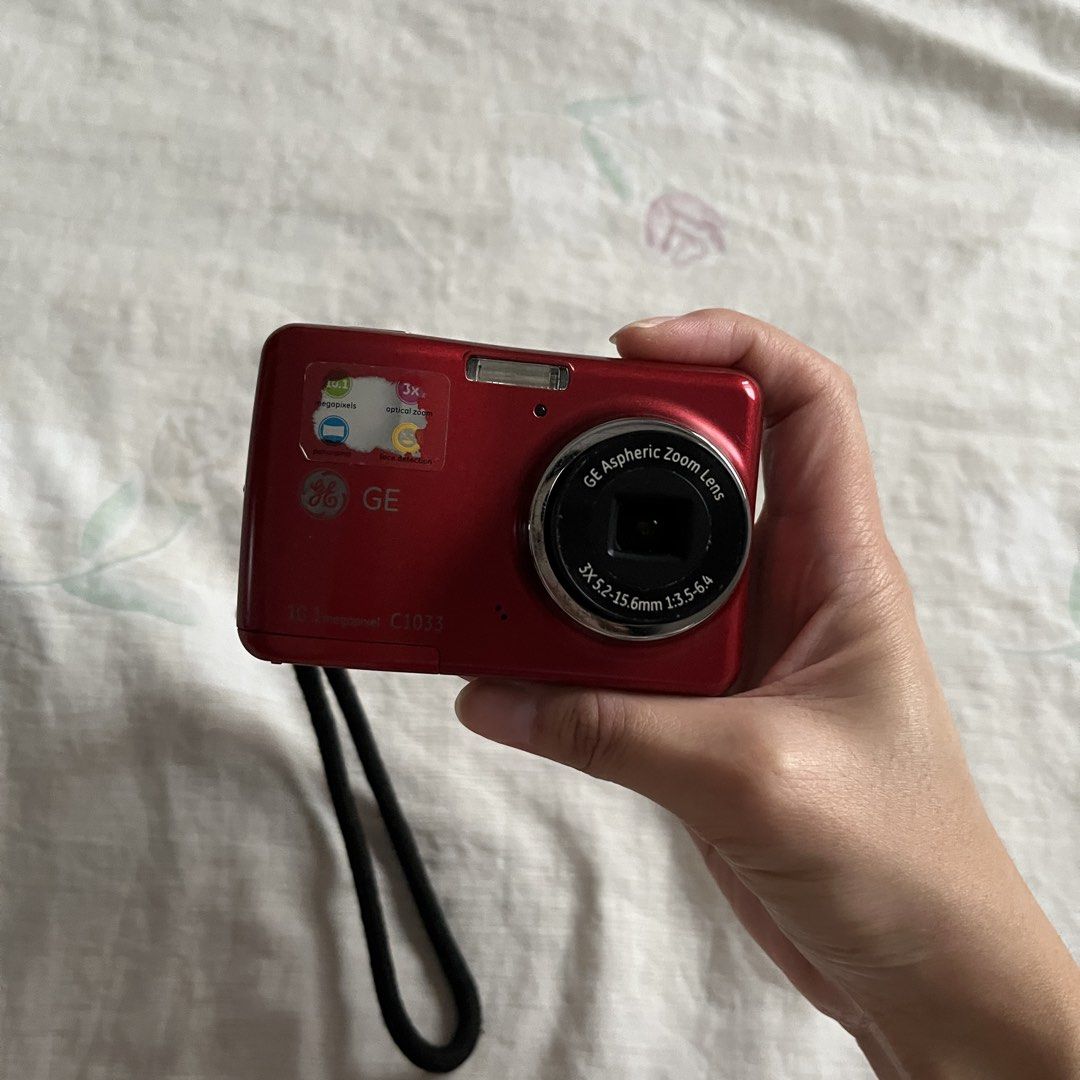 GE C1033 Digital Camera (Category: Cameras) located in Muntinlupa City. Submitted by maiiels (Listing ID 1470795052, Image 3). Description: — 10.1 megapixels with 3x optical zoom — fully functional, no LCD burns — all buttons, flash and zoom are working — with rechargeable double AA batteries — 5/10 body condition, has scratches and overall looks worn down from use — RFS: decluttering — issue: shutter button is a little sticky, requires patience 