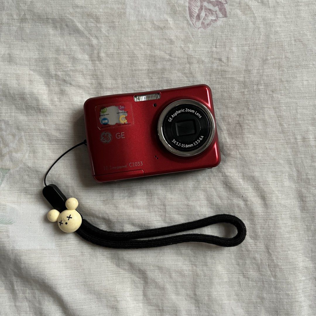 GE C1033 Digital Camera (Category: Cameras) located in Muntinlupa City. Submitted by maiiels (Listing ID 1470795052, Image 1). Description: — 10.1 megapixels with 3x optical zoom — fully functional, no LCD burns — all buttons, flash and zoom are working — with rechargeable double AA batteries — 5/10 body condition, has scratches and overall looks worn down from use — RFS: decluttering — issue: shutter button is a little sticky, requires patience 