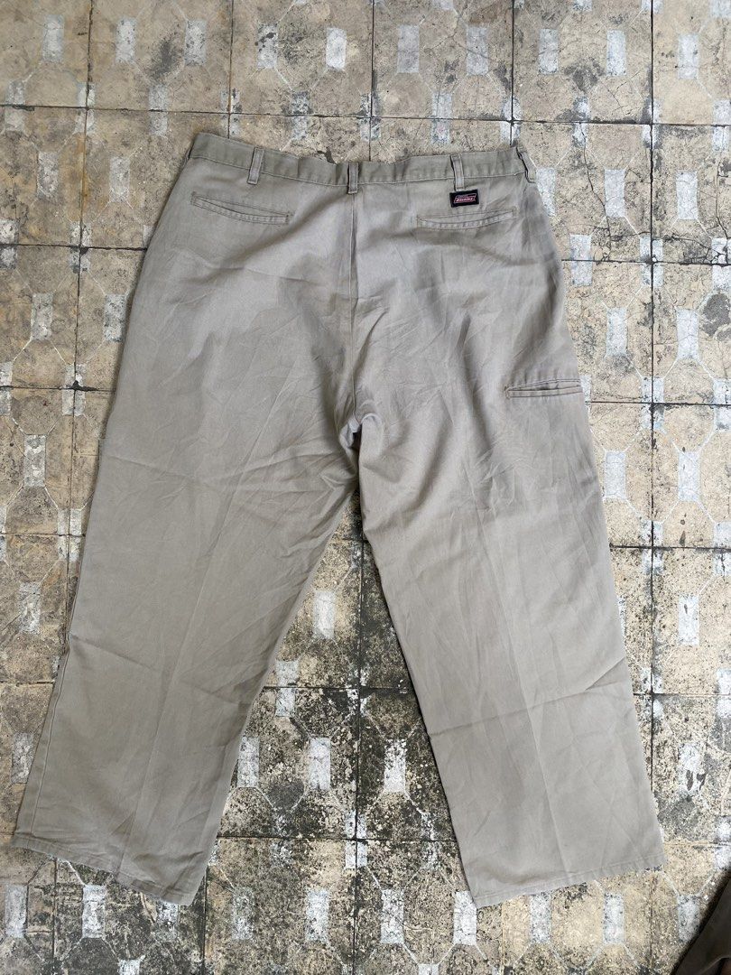 Genuine Dickies Double Knee Work Pants Khaki Size 40 (Category: Chinos) located in Imus. Submitted by frootiloots4103 (Listing ID 1470769194, Image 2). Description: - Brand: Genuine Dickies - Style: Double knee work pants / utilitarian trousers - Color: Khaki - Size: Tagged 40x39.5x10 - Features: Reinforced knee panels for extra durability, sturdy belt loops, and functional back welt pockets - Details: Signature Dickies red logo label on the leg 