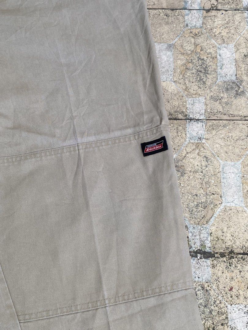 Genuine Dickies Double Knee Work Pants Khaki Size 40 (Category: Chinos) located in Imus. Submitted by frootiloots4103 (Listing ID 1470769194, Image 3). Description: - Brand: Genuine Dickies - Style: Double knee work pants / utilitarian trousers - Color: Khaki - Size: Tagged 40x39.5x10 - Features: Reinforced knee panels for extra durability, sturdy belt loops, and functional back welt pockets - Details: Signature Dickies red logo label on the leg 