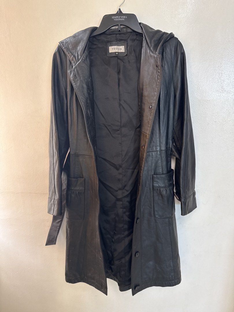 Genuine Lamb Leather Hooded Long Jacket (Category: Coats, Jackets and Outerwear) located in Quezon City. Submitted by dropdeadprices (Listing ID 1470781044, Image 2). Description: - Brand/Model: TESSIE Genuine Lamb Leather Hooded Long Jacket - Size: Medium (M) - Color: Classic Black - Material: 100% Genuine Lamb Leather Shell, 100% Polyester Lining - Features: Attached hood, front button closure, matching adjustable waist belt, and two functional