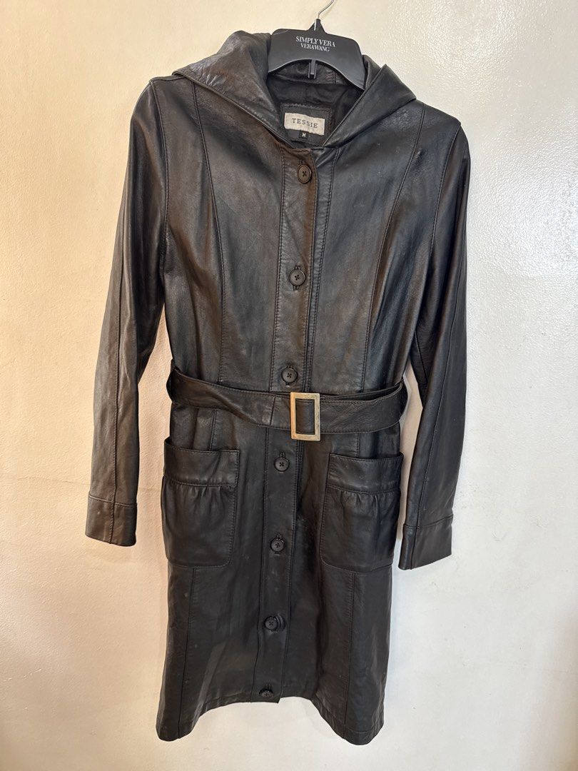 Genuine Lamb Leather Hooded Long Jacket (Category: Coats, Jackets and Outerwear) located in Quezon City. Submitted by dropdeadprices (Listing ID 1470781044, Image 1). Description: - Brand/Model: TESSIE Genuine Lamb Leather Hooded Long Jacket - Size: Medium (M) - Color: Classic Black - Material: 100% Genuine Lamb Leather Shell, 100% Polyester Lining - Features: Attached hood, front button closure, matching adjustable waist belt, and two functional