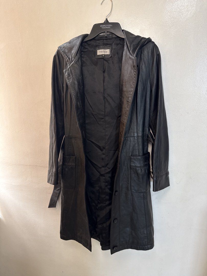 Genuine Lamb Leather Hooded Long Jacket (Category: Coats, Jackets and Outerwear) located in Quezon City. Submitted by dropdeadprices (Listing ID 1470781044, Image 3). Description: - Brand/Model: TESSIE Genuine Lamb Leather Hooded Long Jacket - Size: Medium (M) - Color: Classic Black - Material: 100% Genuine Lamb Leather Shell, 100% Polyester Lining - Features: Attached hood, front button closure, matching adjustable waist belt, and two functional