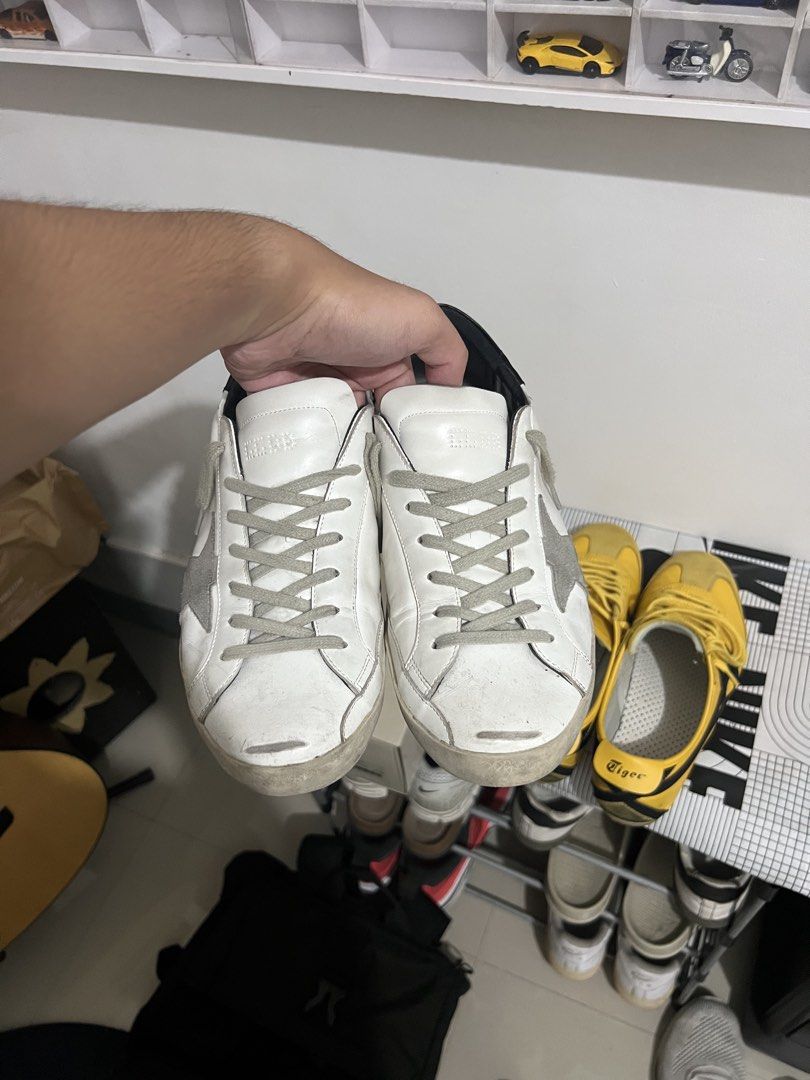 GGDB Superstar Black Tab (Category: Casual Shoes) located in Manila. Submitted by francohaze (Listing ID 1470883030, Image 2). Description: - r3ps only - used - size 11 (fits size 12 as far as i know) - minor heel drag (not noticeable when worn) - a few scratches and creases from usage - distressed/dirty, but can be cleaned upon request - issue: small cracks on outer sides of each pair, does not affect overall shoe and not that noticeable 4.5 + s