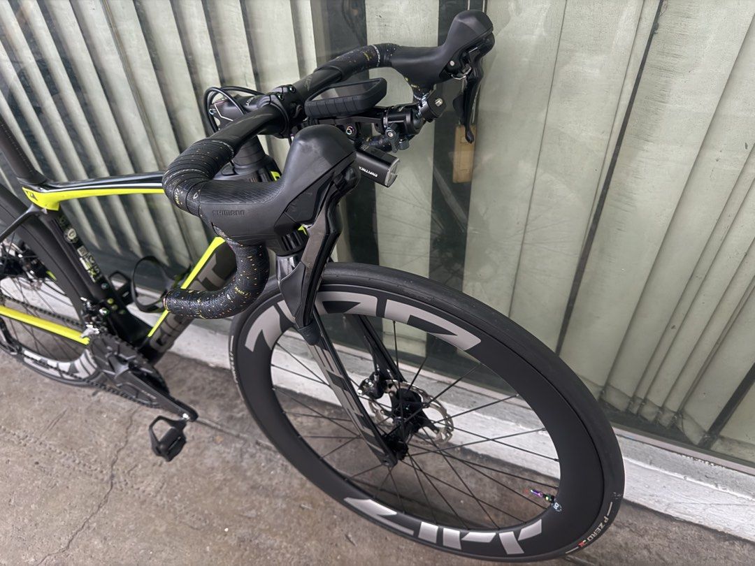 Giant Defy Advance 3 XS (Category: Bicycles) located in Quezon City. Submitted by ronsatch (Listing ID 1470789871, Image 3). Description: - Brand/Model: Giant Defy Carbon Fiber Road Bike - Color: Black and Yellow - Groupset: Shimano 105 hydraulics 7020 - Wheelset: Airwolf 60MM Carbon Rims with Pirelli P Zero tires - Saddle: Selle Italia - Extras: Custom motivational text decal near head tube, bottle cage, handlebar mount, and rear safety light - 