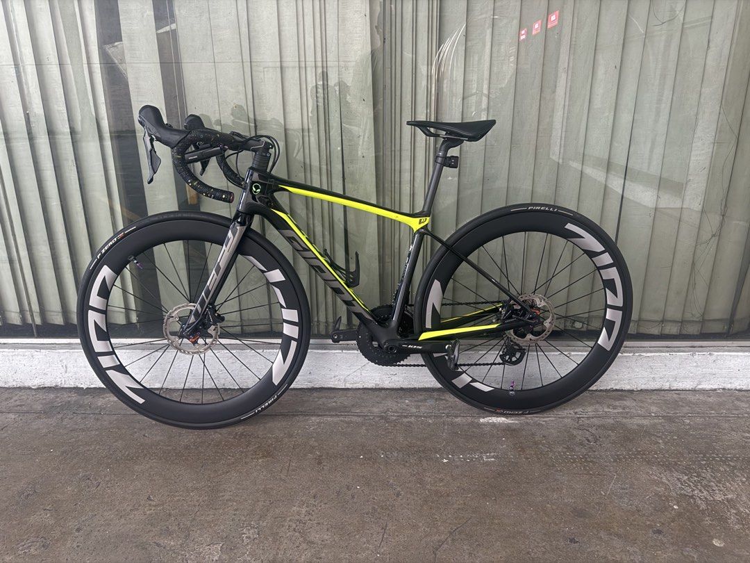 Giant Defy Advance 3 XS (Category: Bicycles) located in Quezon City. Submitted by ronsatch (Listing ID 1470789871, Image 2). Description: - Brand/Model: Giant Defy Carbon Fiber Road Bike - Color: Black and Yellow - Groupset: Shimano 105 hydraulics 7020 - Wheelset: Airwolf 60MM Carbon Rims with Pirelli P Zero tires - Saddle: Selle Italia - Extras: Custom motivational text decal near head tube, bottle cage, handlebar mount, and rear safety light - 