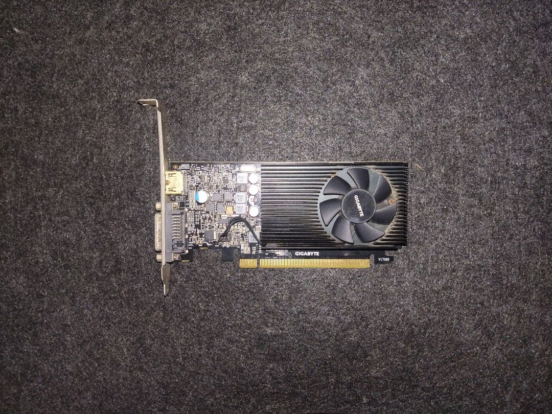 Gigabyte GT 1030 2GB Low Profile Graphics Card (Category: Computer Parts) located in Cabuyao City. Submitted by aldrinmacalalad (Listing ID 1470756968, Image 1). Description: - Model: Gigabyte GT 1030 - Cooling: Single fan setup with low-profile bracket attached - Ports: HDMI and DVI output ports - Condition: Tested and 100% working under stress test (pulled from a working system) - Note: Minor dust buildup on the heatsink and metal bracket NEGOT