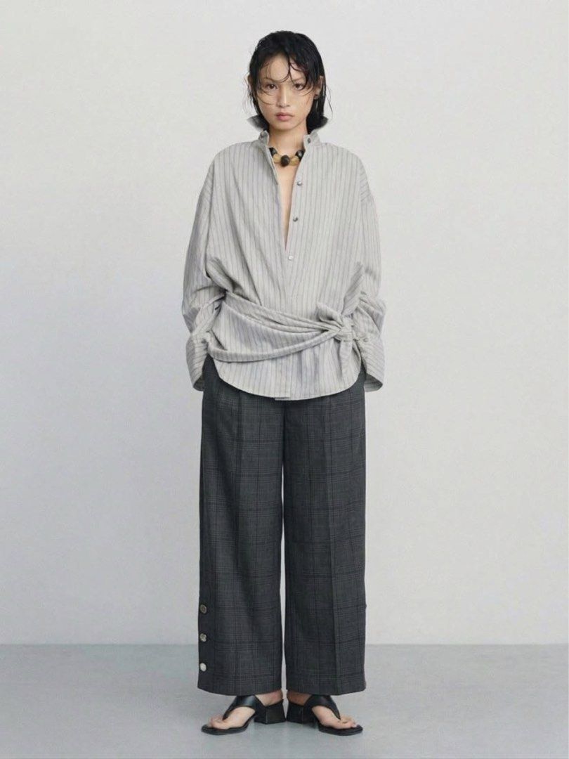 Gingham korean wideleg Trousers (Category: Jeans) located in Manila. Submitted by morningthrifters (Listing ID 1470864751, Image 1). Description: 📝Grey plaid cropped wide-leg trousers, also widely known as culottes. They feature a high-rise structured waistband, front pleats for added volume, and a traditional Glen plaid check pattern. 📍Pateros Metro Manila 🚚 Jnt / Lalamove / Pickup 📐 Size 27-34 💗 Second time buyers has a free item, follow m