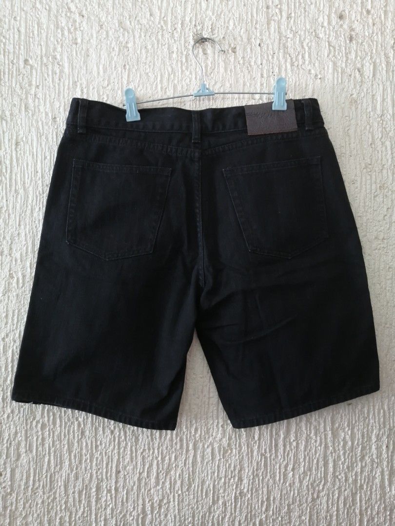 Givenchy Paris Black Denim Shorts with Logo Side Tape (Category: Shorts) located in Angono. Submitted by rlinee_93 (Listing ID 1470791573, Image 2). Description: - Brand: Givenchy Paris - Item: Black denim shorts - Fit: Straight fit - Details: Branded logo tape stripe on left leg, button fly, front and back pockets - Branding: Debossed leather patch on back waistband and interior brand tag - Material: 100% solid black cotton denim - Condition: Ex
