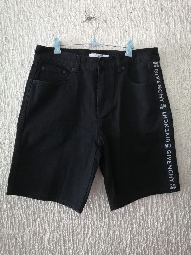 Givenchy Paris Black Denim Shorts with Logo Side Tape (Category: Shorts) located in Angono. Submitted by rlinee_93 (Listing ID 1470791573, Image 1). Description: - Brand: Givenchy Paris - Item: Black denim shorts - Fit: Straight fit - Details: Branded logo tape stripe on left leg, button fly, front and back pockets - Branding: Debossed leather patch on back waistband and interior brand tag - Material: 100% solid black cotton denim - Condition: Ex