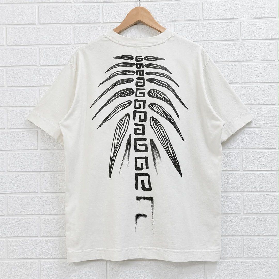 Givenchy Spine Graphic Shirt (Category: Luxury Apparel) located in Taguig. Submitted by thriftstar2 (Listing ID 1470930504, Image 2). Description: W 23 L 28 No issue .