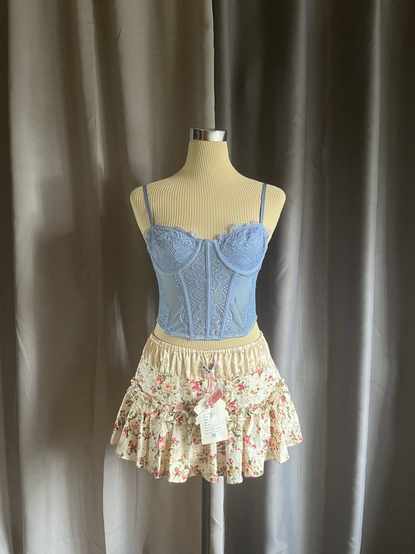 Glassons Light Blue Lace Corset Cami Top (Category: Sleeveless) located in Cagayan de Oro. Submitted by curated_closetph (Listing ID 1470746845, Image 1). Description: — Size: XS - S — Color: Light Blue — Floral lace overlay with sheer mesh side panels — Sweetheart neck with scalloped lace eyelash trim — Underwire structure and adjustable cami straps — Curved asymmetrical hem — Multi-hook back closure line — Can negotiate the price — 🛒 Shop more