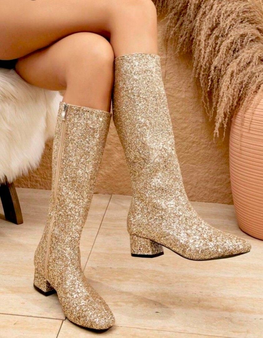 Gold Glitter Knee-High Boots Block Heel (Category: Boots) located in Baguio. Submitted by shopmycl0sets (Listing ID 1470750153, Image 1). Description: ✔️ Color & Finish: Dazzling gold glitter with a high-shine finish ✔️ Style: Knee-high statement boots with a round toe ✔️ Heel: Comfortable chunky low block heel about 2" height ✔️ Closure: Easy side zipper for quick wear ✔️ Occasion: Perfect for parties, nights out, christmas and other special eve