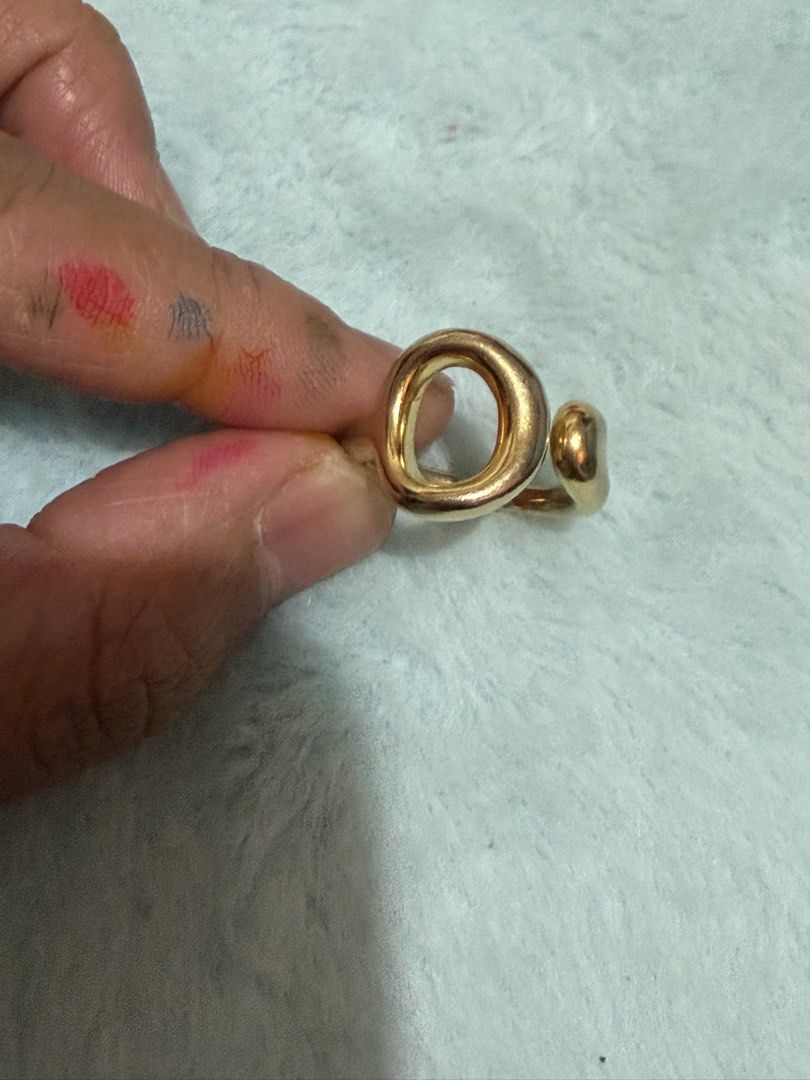 Gold Tone Open Ring Chunky Wave Design Size 6 (Category: Rings) located in Mandaue City. Submitted by chuchi152615 (Listing ID 1470919453, Image 1). Description: - Gold tone open ring with a chunky wave shape and teardrop end - Adjustable fit band for comfort and versatility - Minimalist style, easy to stack or wear alone - Smooth polished finish all over - Great everyday accessory.