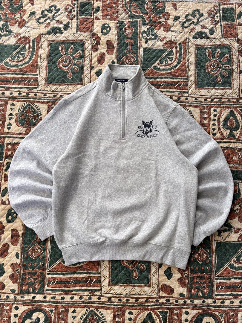 Gray Sport-Tek quarter-zip sweatshirt (Category: Coats, Jackets and Outerwear) located in Baguio. Submitted by zojythriftph (Listing ID 1470900072, Image 1). Description: Gray Sport-Tek quarter-zip sweatshirt L27, w22 | Medium- Large No flaws, Like new Color rate 10/10 .