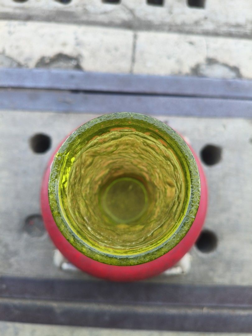 Green Textured Glass Vase (Category: Vases & Decorative Bowls) located in Manila. Submitted by tonio124 (Listing ID 1470771948, Image 2). Description: - Product: Green glass vase - Design: Straight cylindrical shape with a rough, bark-like texture - Stability: Features a solid base for secure placement on tables or shelves - Versatility: Ideal for floral arrangements or as a standalone decor piece.
