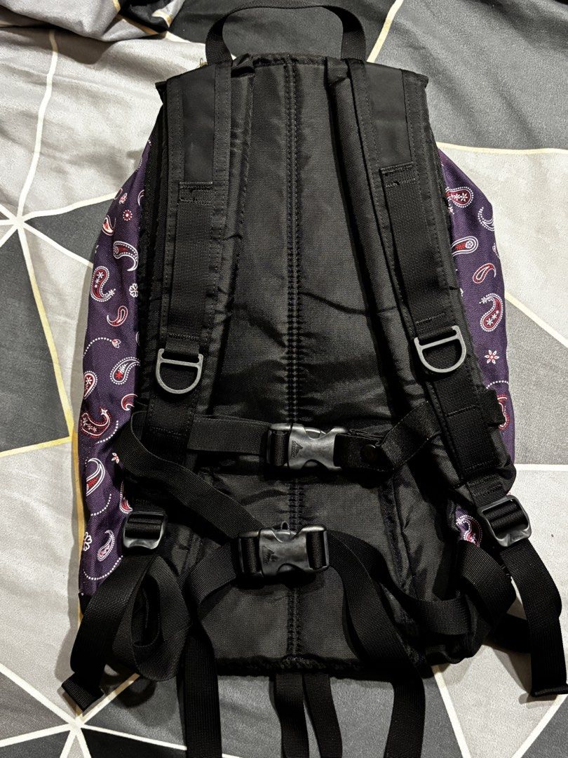 Gregory Purple Paisley Backpack (Category: Backpacks) located in Manila. Submitted by bizcuits (Listing ID 1470923792, Image 2). Description: - Brand: Gregory - Design: Stylish purple paisley pattern with black straps - Hardware: Smooth YKK zippers with leather pulls and silver-tone metal adjusters - Storage: Large main compartment with an interior slip pocket - Comfort: Includes both sternum and waist buckles for secure wear - Condition: Sturdy 