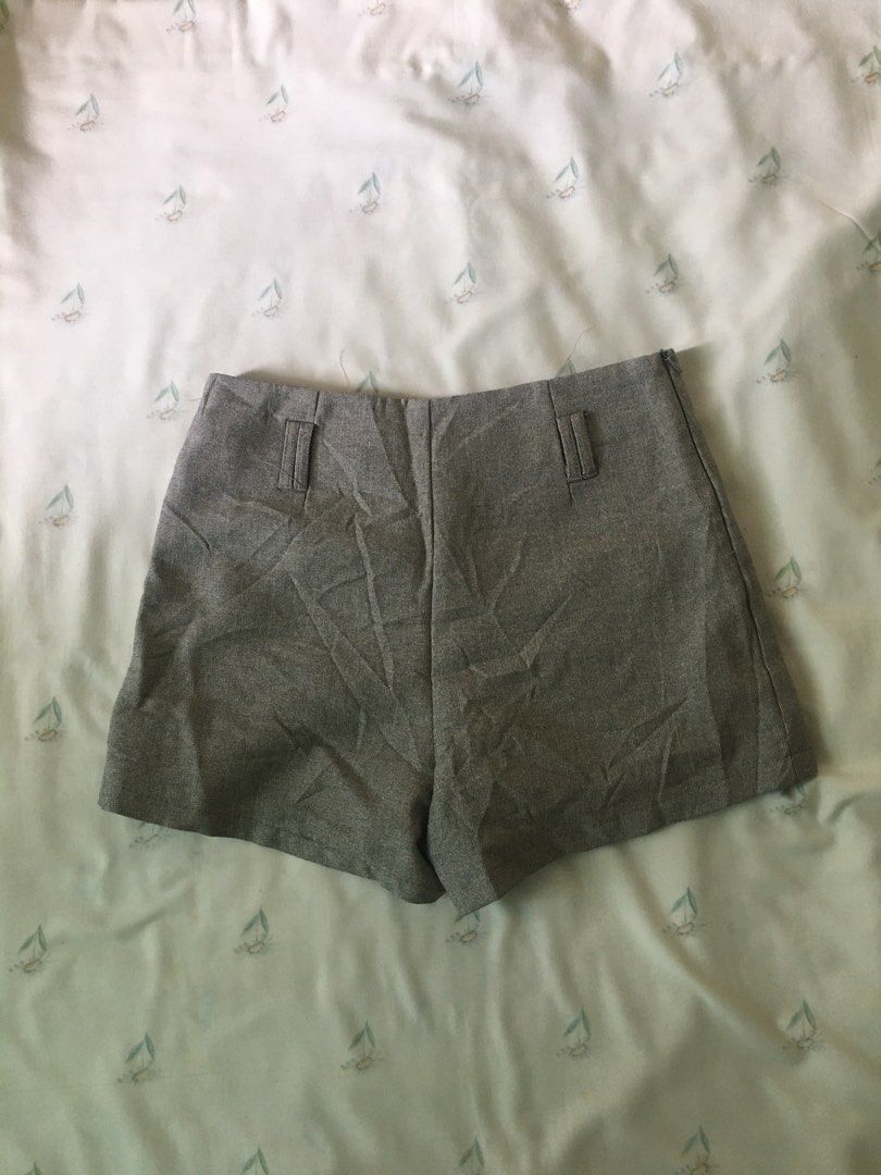 Grey high-waist shorts with pockets (Category: Shorts) located in Cabuyao City. Submitted by 4everblooms (Listing ID 1470800826, Image 3). Description: - Waistline: up to 29 - Fit: High-waist with a clean back and side zipper closure - Styling: Pairs effortlessly with blouses or basic tees for a chic smart-casual look.