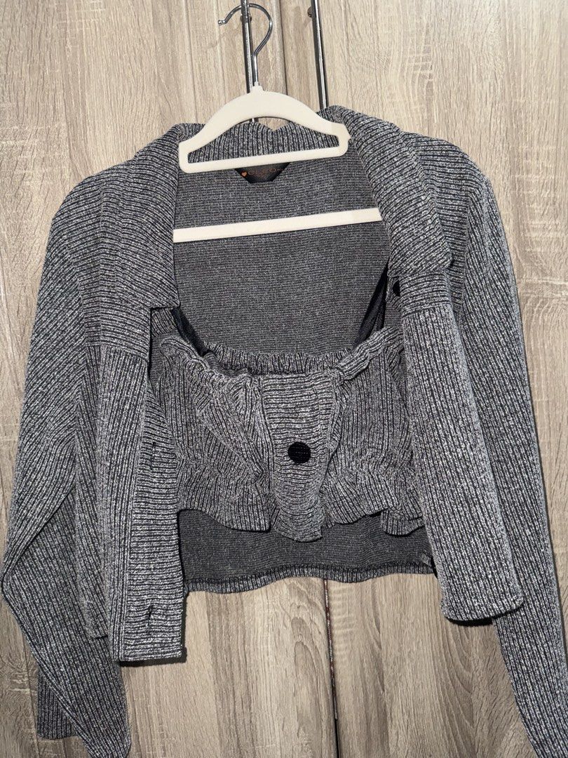 Grey knit two-piece crop top and jacket set (Category: Sets or Coordinates) located in Caloocan City. Submitted by femmiecruz (Listing ID 1470834841, Image 1). Description: - Brand: Cleo - Set includes: Long-sleeve cropped button-up jacket with collar and pockets + strapless crop top with ruffled detailing and front button accent - Color/Pattern: Grey and white textured knit - Material: Stretchy, comfortable fabric - Styling: Wear together as a m