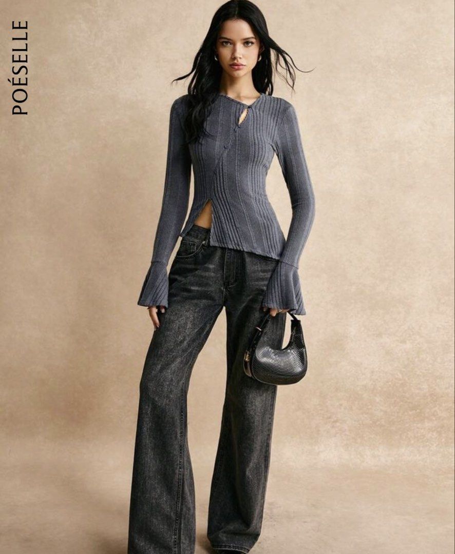 Grey Ribbed Knit Top with Diagonal Button Placket (Category: Sleeveless) located in Pateros City. Submitted by abbymoana (Listing ID 1470762087, Image 2). Description: - Color: Dark grey - Material: Stretchy ribbed knit - Design: Long sleeves with flared cuffs, diagonal asymmetric button placket, split hem, and small neckline cutout - Fit: Slim-fitting silhouette - Condition: Like new (worn once for a shoot, zero flaws).