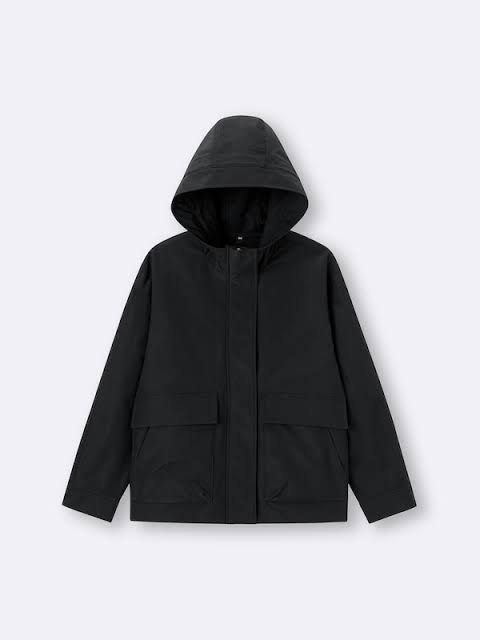 GU MOUNTAIN PARKA (Category: Coats, Jackets and Outerwear) located in Angeles City. Submitted by donita_camorongan (Listing ID 1470768208, Image 1). Description: - Color: Solid black - Hood: Oversized and attached - Closure: Full front zipper with snap button storm flap - Pockets: Two roomy front pockets with flaps - Cuffs: Adjustable with gold-toned metal snaps - Condition/Material: Clean fabric with a smooth texture throughout - Style: Great da