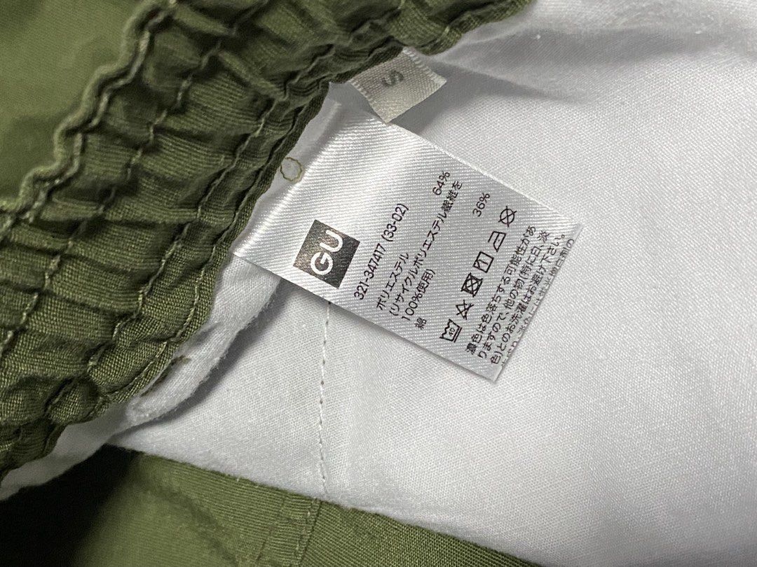 GU Olive Green Cargo Pants Size S (Category: Jeans) located in Las Pinas. Submitted by boldbear_89ab40 (Listing ID 1470827740, Image 2). Description: - Brand/Model: GU Olive Green Cargo Pants - Size: S - Material: 64% Polyester, 36% Cotton blend - Waistband: Elastic with button closure - Pockets: Functional side pockets and utility cargo pockets - Hem: Adjustable drawstring at the ankles - Condition: Great casual everyday wear.