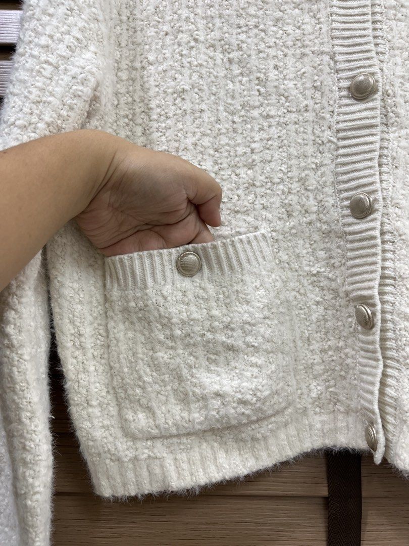 GU Textured Knit Cardigan Off White Size M (Category: Coats, Jackets and Outerwear) located in Mabalacat. Submitted by fashionclothesph (Listing ID 1470848686, Image 3). Description: - Brand: GU - Color: Off-white - Size: M - length22inch - width20inch - Material: 54% polyester, 31% acrylic, 15% nylon - Style: Textured knit cardigan with round neckline - Details: Silver-tone decorative buttons and two front pockets with button trim - Finish: Ribb