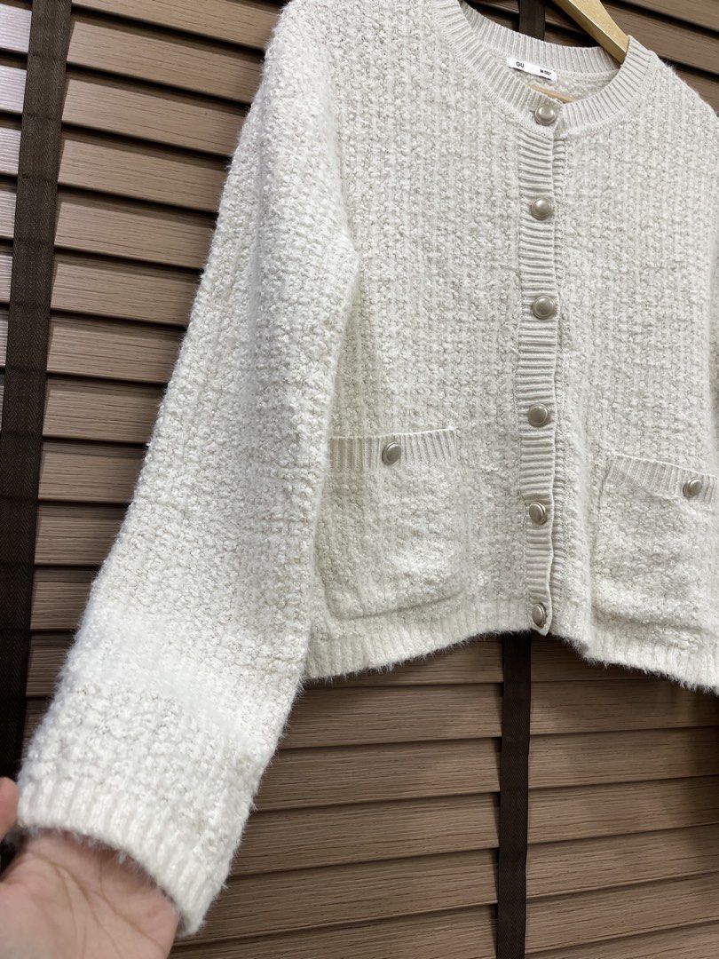 GU Textured Knit Cardigan Off White Size M (Category: Coats, Jackets and Outerwear) located in Mabalacat. Submitted by fashionclothesph (Listing ID 1470848686, Image 2). Description: - Brand: GU - Color: Off-white - Size: M - length22inch - width20inch - Material: 54% polyester, 31% acrylic, 15% nylon - Style: Textured knit cardigan with round neckline - Details: Silver-tone decorative buttons and two front pockets with button trim - Finish: Ribb