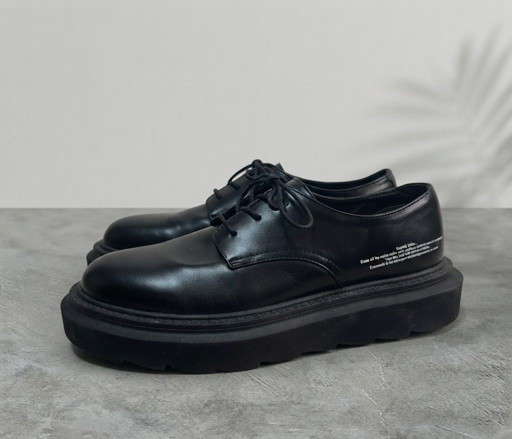 Undercover Chunky Sole Plain Toe Shoes (Category: Sneakers & Footwear) located in Baguio. Submitted by luxeloomarchive (Listing ID 1470743458, Image 1). Description: GU x Undercover Chunky Sole Plain Toe Shoes Own a piece of the limited-edition collaboration between Japanese streetwear icon Undercover and GU. These blend high-fashion punk aesthetics with everyday streetwear edge.✨ Features:Iconic Graphic: Features the printed "Kosmik Noise..." po