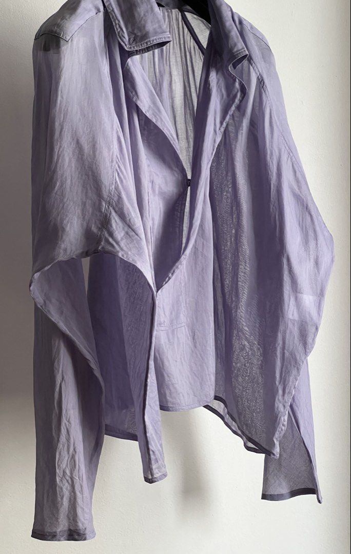 Gucci by Tom Ford Fall 2004 cotton shirt (Category: Luxury Apparel) located in Quezon City. Submitted by raccoonfur (Listing ID 1470822426, Image 3). Description: Gucci by Tom Ford light lavender cotton voile peasant blouse. Light as air and drapes impeccably. Has few faint collar stains. No rips or holes. Sleeve tapers on a bias and pools beautifully in the forearm when worn. Great condition. Flat measurements: Pit to pit 87.25cm/34.25in Length 