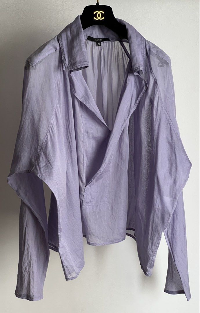 Gucci by Tom Ford Fall 2004 cotton shirt (Category: Luxury Apparel) located in Quezon City. Submitted by raccoonfur (Listing ID 1470822426, Image 1). Description: Gucci by Tom Ford light lavender cotton voile peasant blouse. Light as air and drapes impeccably. Has few faint collar stains. No rips or holes. Sleeve tapers on a bias and pools beautifully in the forearm when worn. Great condition. Flat measurements: Pit to pit 87.25cm/34.25in Length 