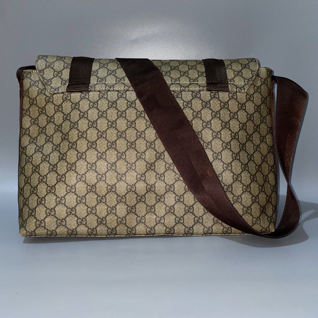 Gucci GG Supreme Messenger Bag (Category: Luxury Bags & Wallets) located in Manila. Submitted by astral_ (Listing ID 1470876829, Image 2). Description: Gucci GG Supreme Messenger Bag Authentic Size: Medium to large Condition: Lightly used Issue: minor canvas crack & front zipper pull tab is missing but functions smoothly Width: 17 in Height: 11 in Depth: 5 in Price: 8,000 shipped.