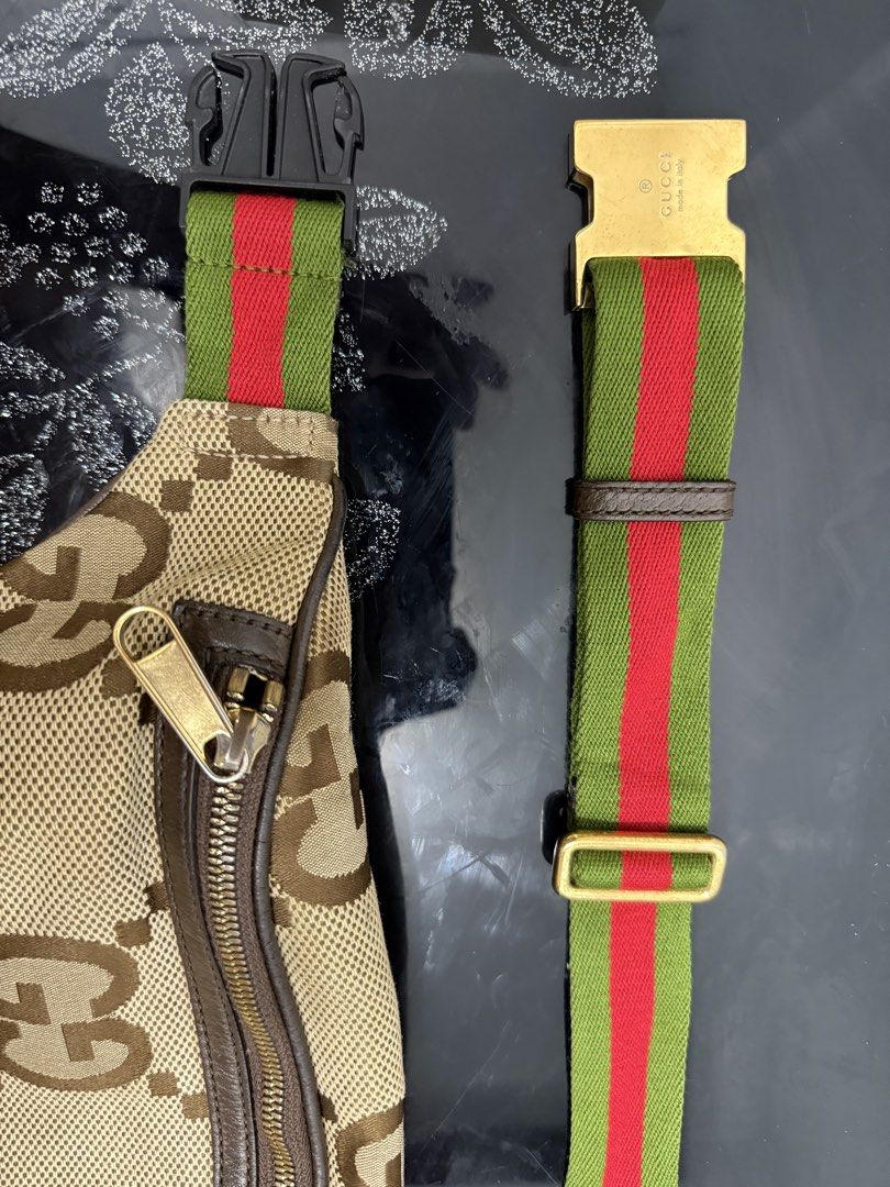Gucci Jumbo GG Canvas Belt Bag (Category: Luxury Bags & Wallets) located in Cabuyao City. Submitted by lakasngthrift23 (Listing ID 1470848540, Image 2). Description: - Authentic Gucci belt bag featuring the iconic jumbo GG canvas pattern - Premium brown leather trim and classic gold-tone zipper hardware - Signature green and red webbing stripe detail near the base - Spacious main interior compartment for your daily essentials - Convenient front e