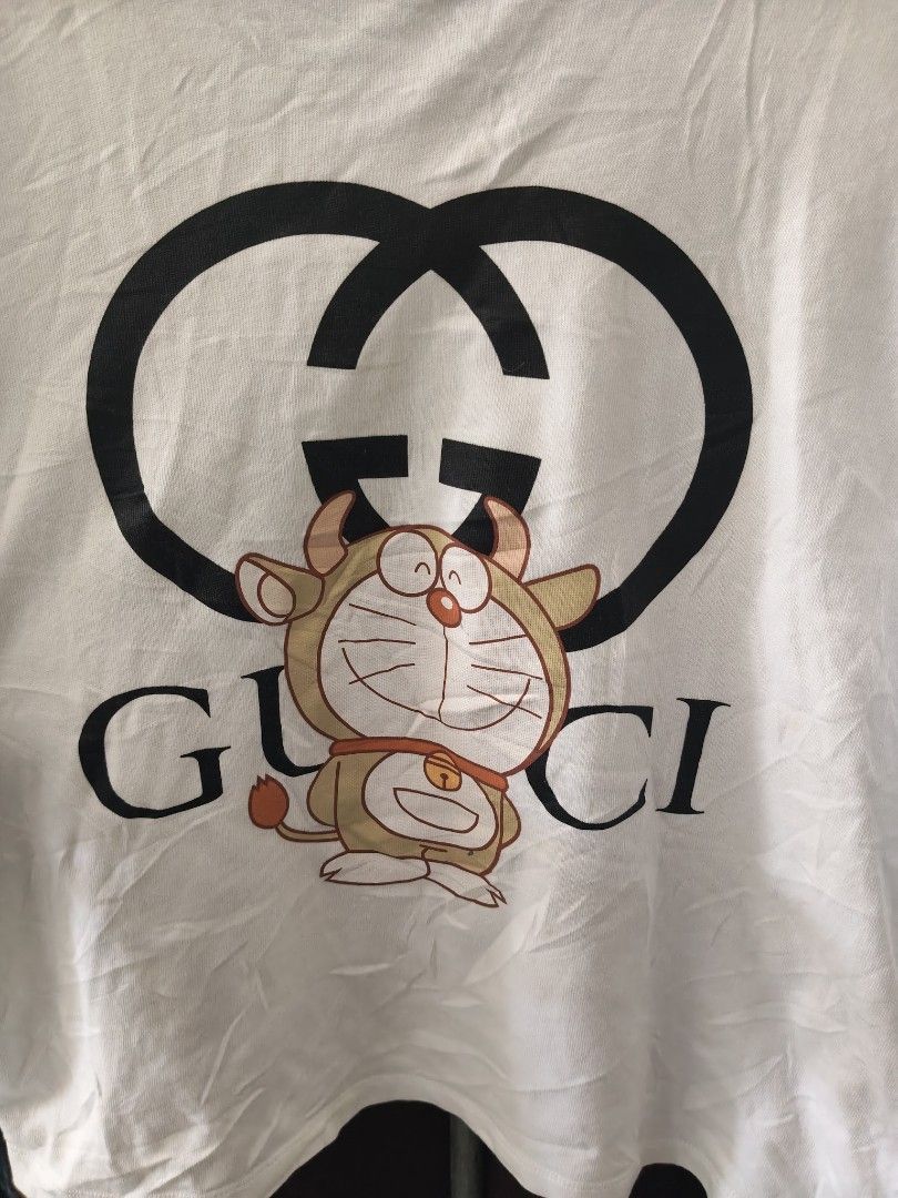 GUCCI x Doraemon Crop T-Shirt (Category: Tshirts & Polo Shirts ) located in Cabadbaran. Submitted by jem1124 (Listing ID 1470762015, Image 2). Description: 23x24.5 excellent condition No issue.