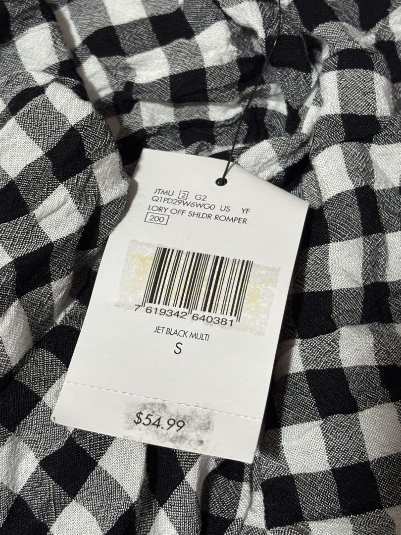 GUESS Lory Off Shoulder Romper Black Gingham Size S (Category: Rompers) located in Quezon City. Submitted by xoxoari (Listing ID 1470824820, Image 3). Description: - Brand: GUESS (Lory Off-Shoulder Romper) - Color/Pattern: Jet Black Multi Gingham Print - Size: Small (fits true to size) - Condition: Brand new with original tags attached - Retail Price: $54.99 - Features: Short puff sleeves, flattering smocked waist, and cute tie detail at the neck
